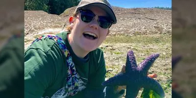 Syd Welsh holding a sea star