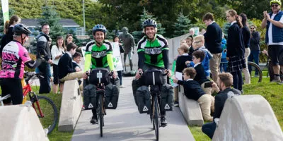 Zac and Nick cross finish line