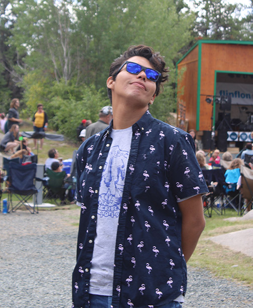 Lucas wearing sunglasses at a music festival