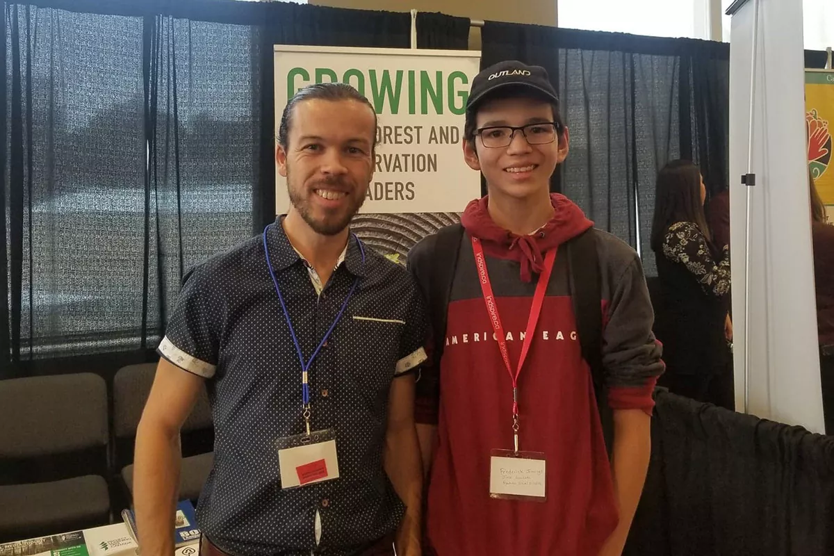 Paul stands with Fredering, a young Indigenous man and PLT Canada Green Jobs alumnus.