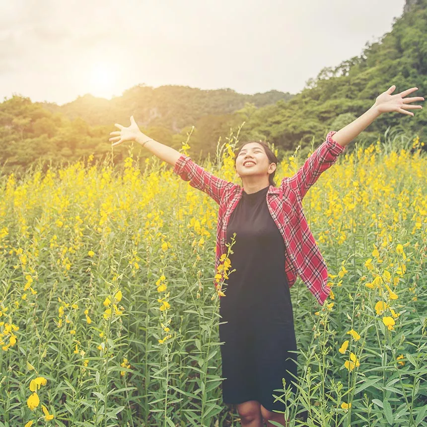 Health-and-Wellness-1.jpg A woman standing in a field