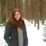 Christine Leduc in a forest